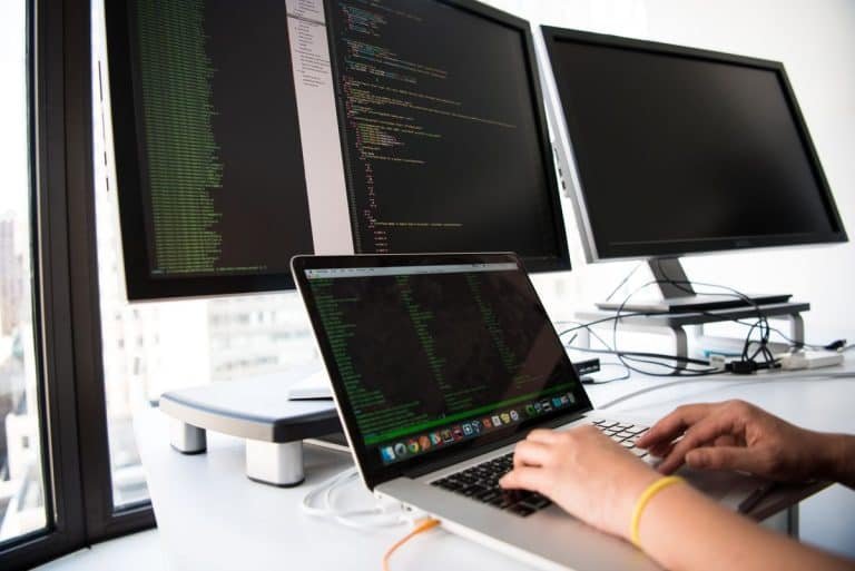 Developer using AI tools to build a WordPress website