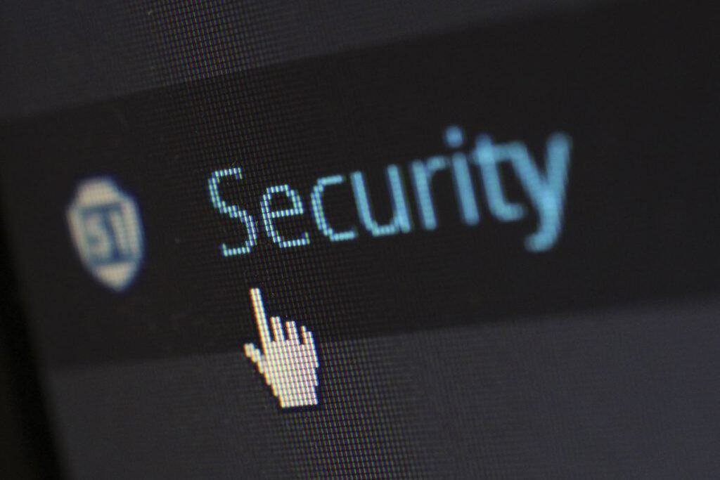 Padlock on a digital screen representing WordPress website security in 2026